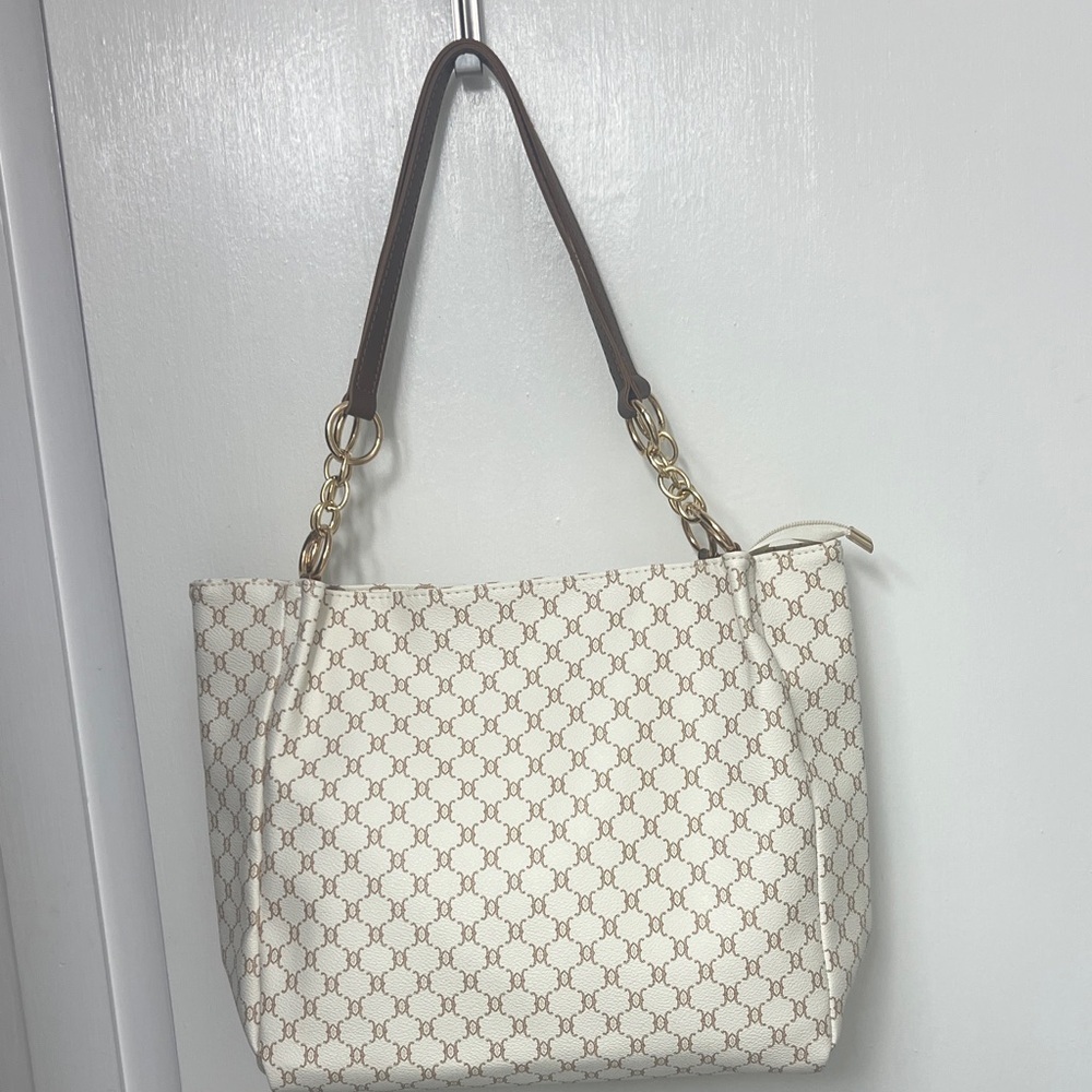 Ladies houndstooth shoulder bag with brown & gold colored chain straps NWOT